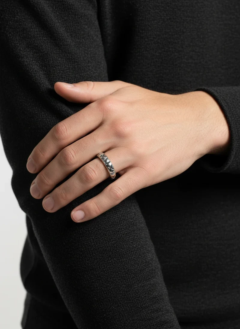 Men's silver textured band ring.