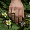 Textured gold and silver statement ring.