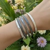 Silver & black ornate bangle bracelets.