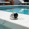 Silver ring with black onyx stone.
