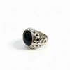 Silver ring with black onyx stone.