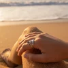 Sterling silver crown ring with black gemstone.