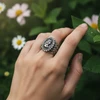 Silver ring with woman's profile cameo.