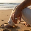 Silver drip ring on a man's hand.