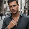 Man wearing silver Hamsa necklace and ring.