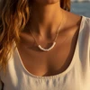 Gold chain pearl necklace.