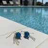 Teal blue glass & silver chain earrings.