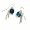 Blue agate drop earrings with silver chains.